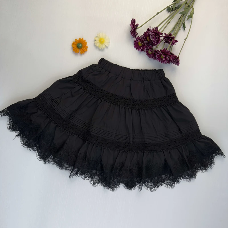 دامن کتان مشکی دخترانه مدل طبقاتی با حاشیه دانتل و گیپور