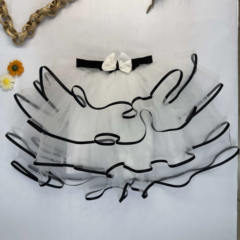 دامن توری توتو (Tutu) دخترانه نوار دوزی شده – رنگ سفید و مشکی