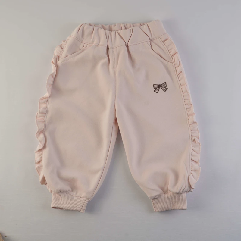 ست بلوز و شلوار دخترانه طرح پاپیون و سرشانه چین‌دار (صورتی ملایم)