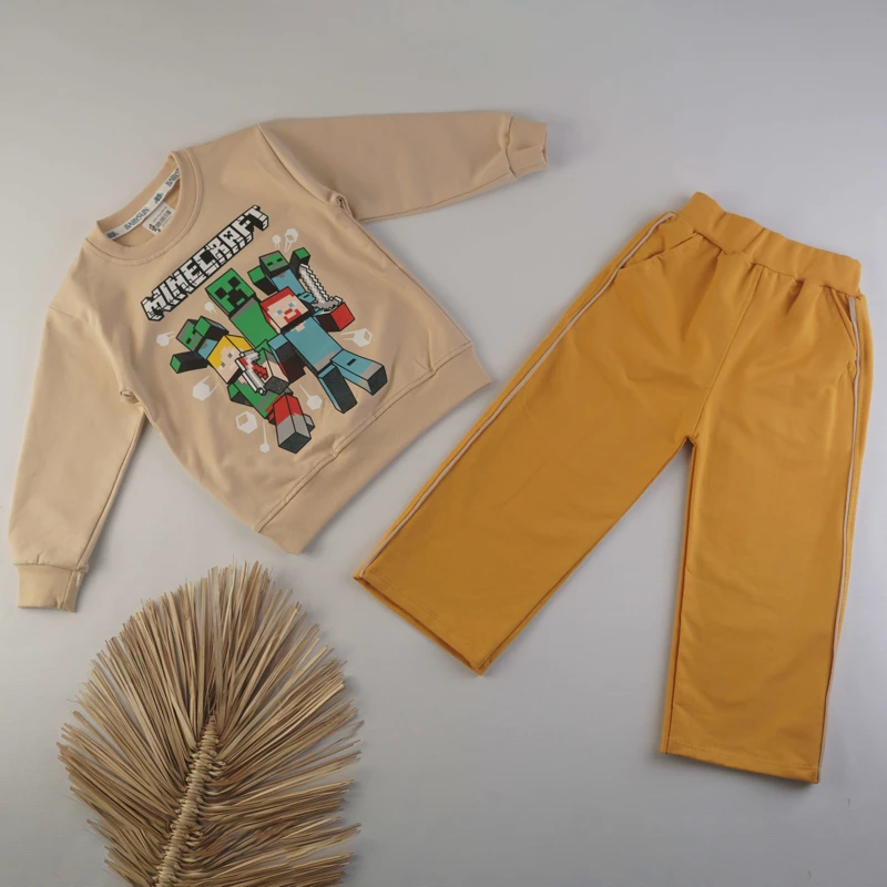 ست بلوز و شلوار پسرانه طرح ماینکرفت (Minecraft) رنگ نسکافه‌ای و خردلی