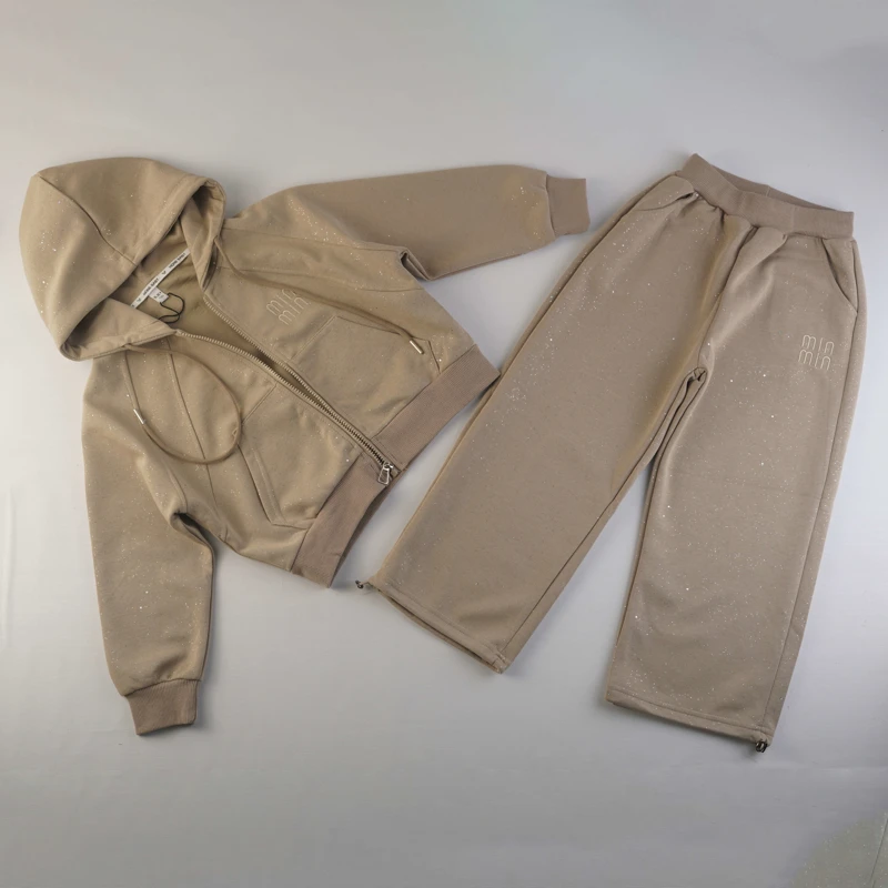 ست هودی و شلوار دخترانه اکلیلی طرح min min – رنگ کرم بژ