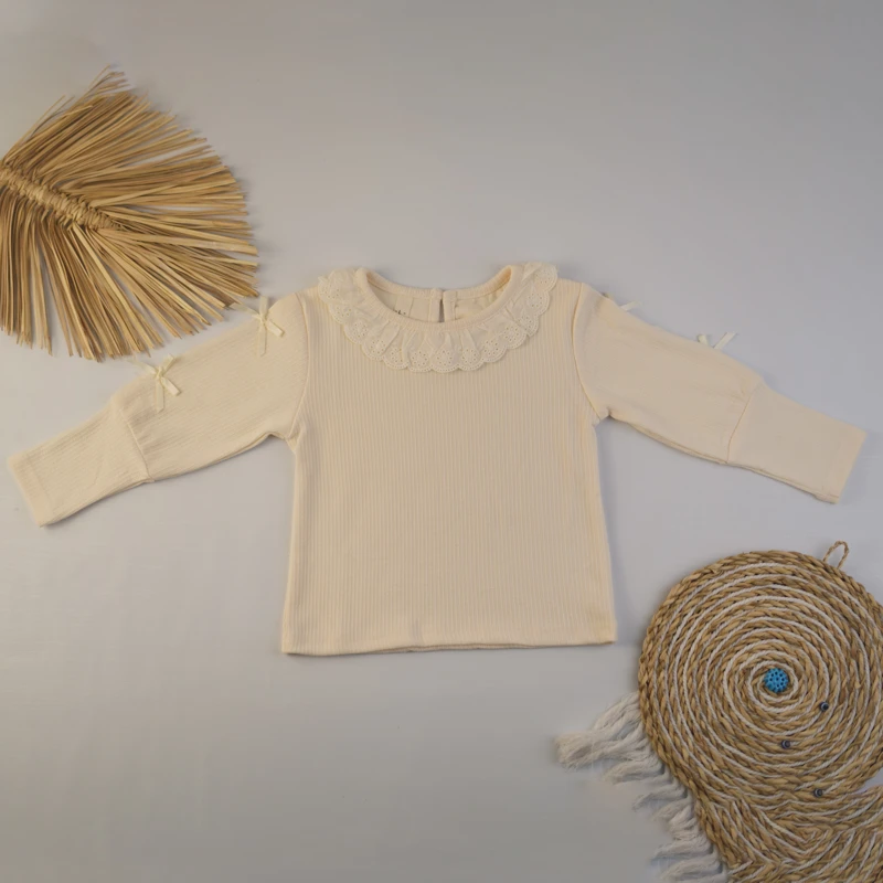 بلوز کرم بچگانه نخ‌پنبه‌ای آستین‌بلند