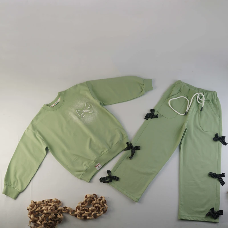 ست دورس و شلوار دخترانه سبز با تزئین پاپیون مشکی