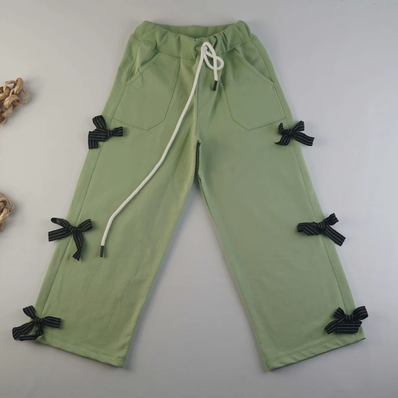 شلوار بگ دخترانه سبز جیب‌دار با طرح پاپیون توری