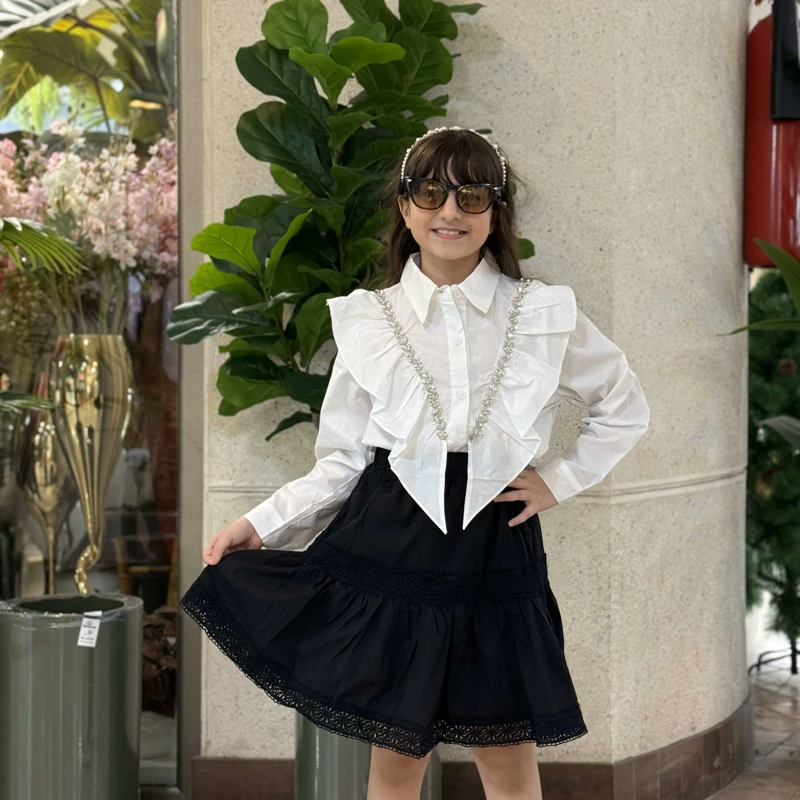 دامن کوتاه دخترانه مشکی با کمر کشی راحت مناسب مهمانی.