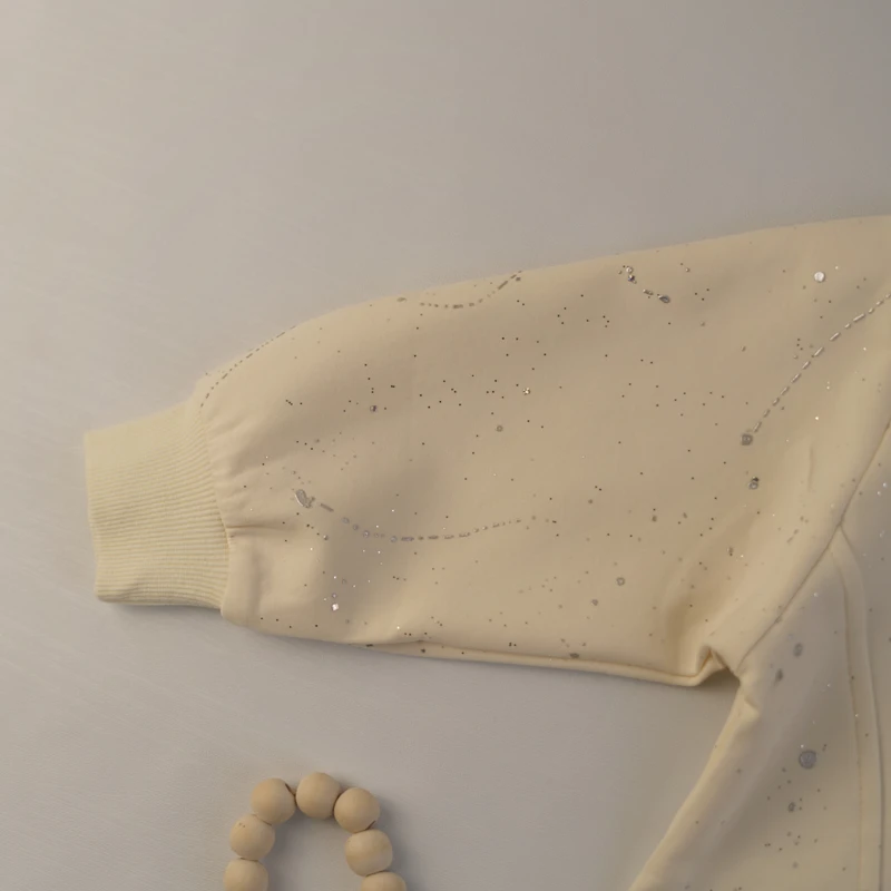 بلوز اسپرت دخترانه کرم شاین‌دار