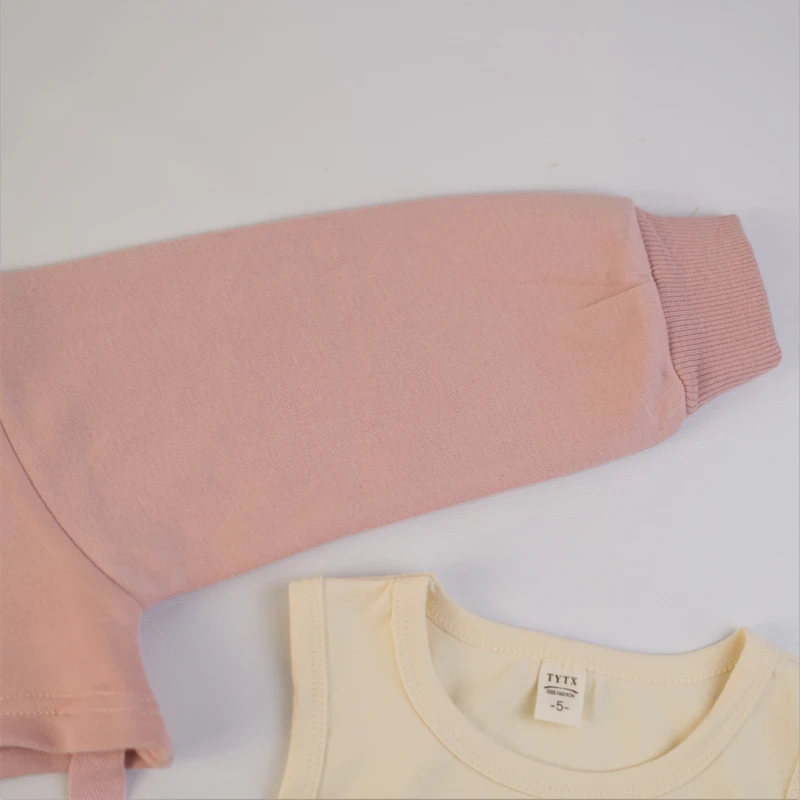 بلوز دخترانه دو لایه با بندهای تزئینی و لوگوی MIU MIU