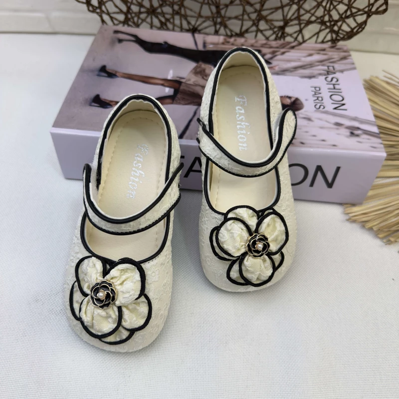 کفش دخترانه گل سفید مشکی